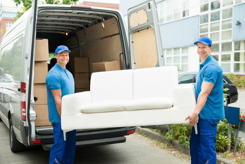 Professional packing team preparing boxes in a Swiss Cottage home