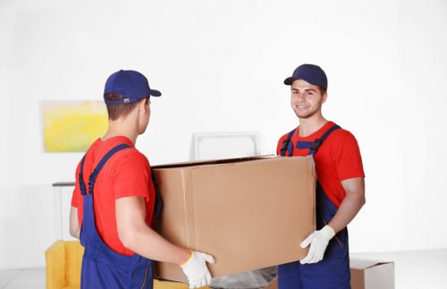 Packed household boxes ready for removals in Swiss Cottage