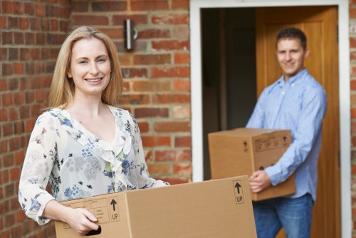 Removal company staff following a health and safety policy