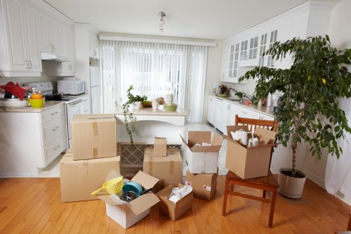Removal quote account for access in a busy Swiss Cottage street