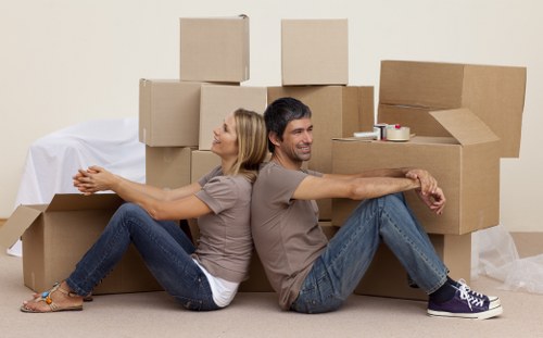Furniture dismantling and loading during an office move in Swiss Cottage