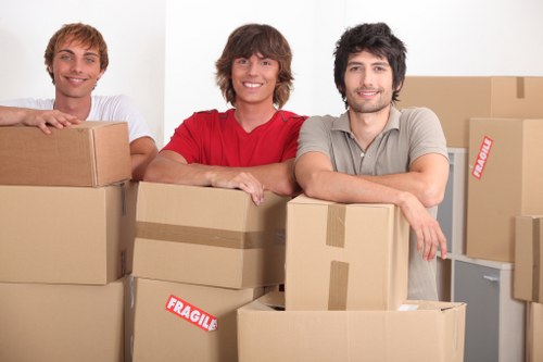 Packed office supplies and labelled boxes prepared for a Swiss Cottage relocation