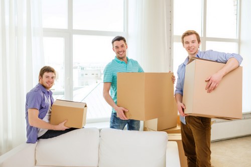 Packed moving boxes ready for transport in a Swiss Cottage removals service