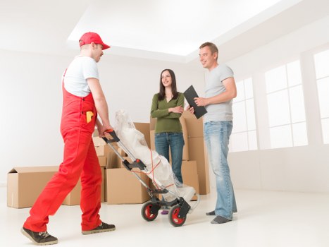 Moving truck and packed boxes for Swiss Cottage house removals