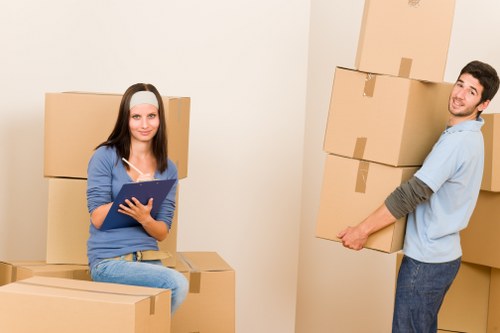 Furniture loading into a moving van in Swiss Cottage